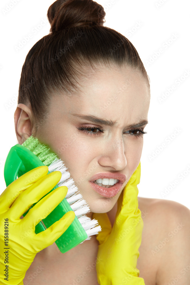 Facial Skin Care. Sexy Woman In Gloves Scrubbing Face With Brush Facial Skin Care. Sexy Woman In Gloves Scrubbing Face With Brush