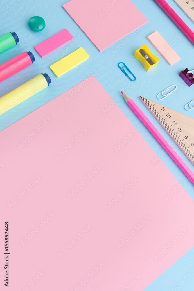 Office supplies on the blue background table Office supplies on the blue background table