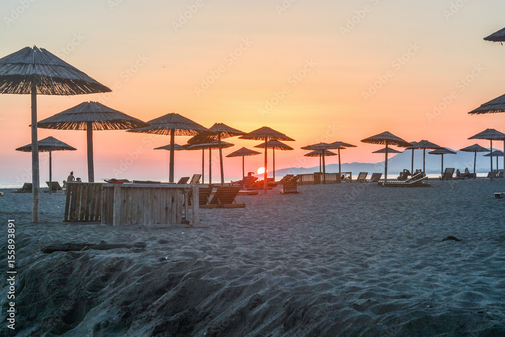 end of a day - sunset, ocean, beach, sky, sun, sand, parasol, summer
