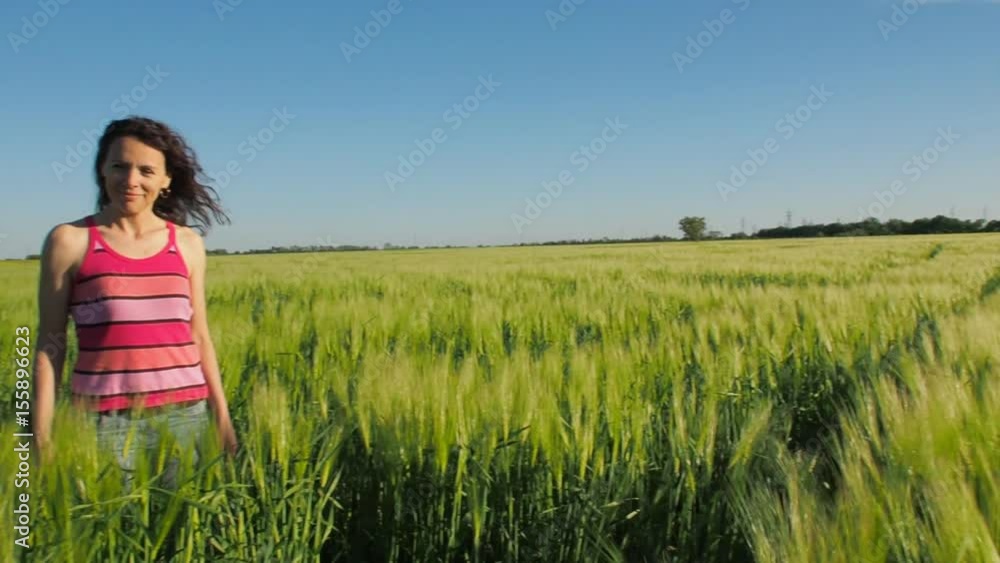 Happy baby is hugging mom. Mom and daughter in a field of wheat. Happy baby is hugging mom. Mom and daughter in a field of wheat.