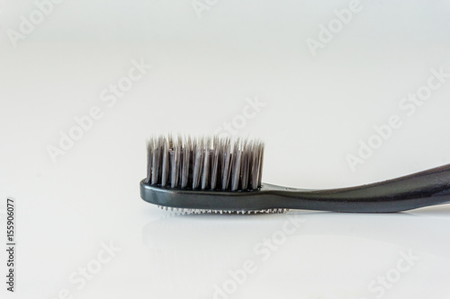 Close up of a new toothbrush without a paste  on a white background. Health concept.