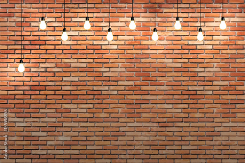 brick wall with bulb lights lamp. nice brick show room with spotlights. 