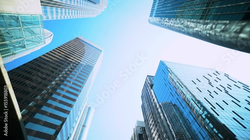 Smooth low angle tracking shot of office buildings.
Low angle office building tracking shot. Beautiful and smooth. Good for video establishing shot, video opening or closing.
