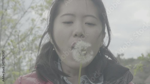 girl blow dandelion-Sony Slog photo