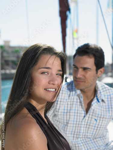 Young couple on yacht © Image Source RF