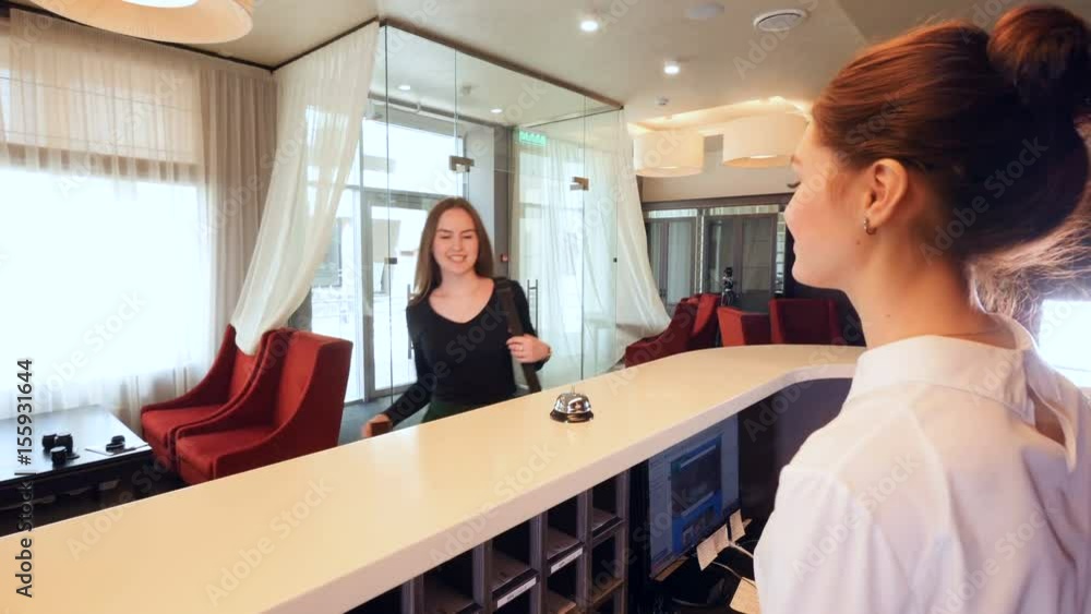 Lobby manager talking phone, meet guests. 4K. Lobby manager talking phone, meet guests. 4K.