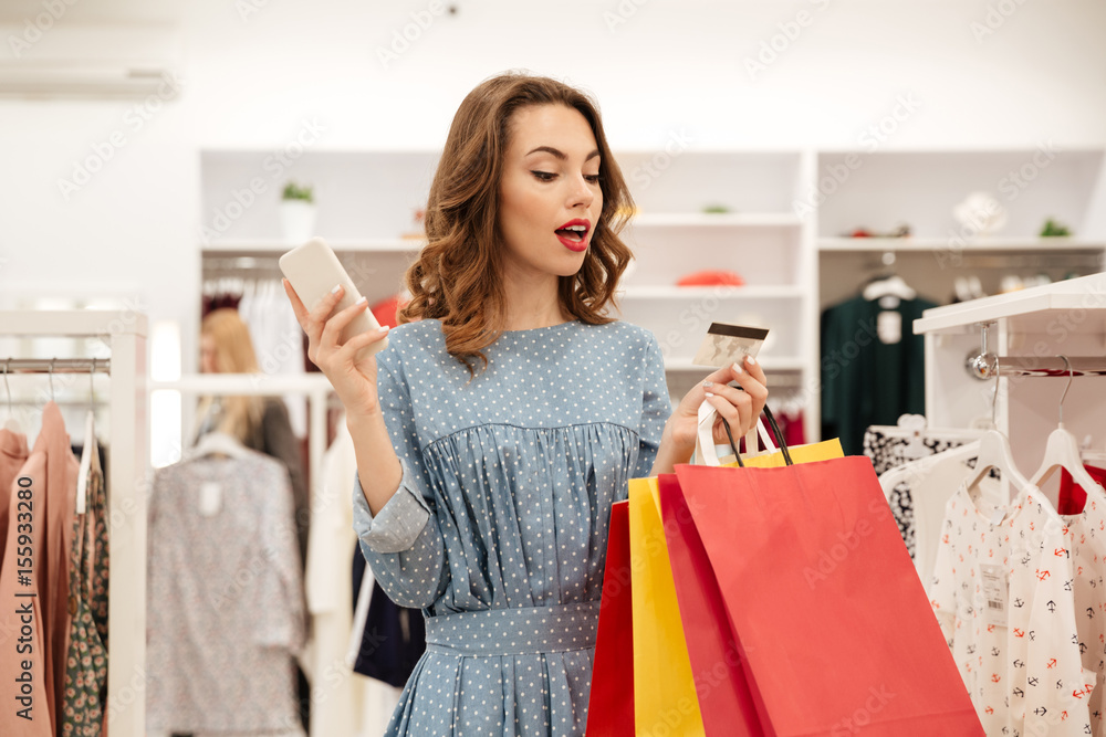 Woman using credit card to shopping online Woman using credit card to shopping online