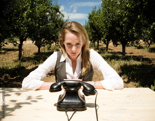 Woman sitting at desk photo