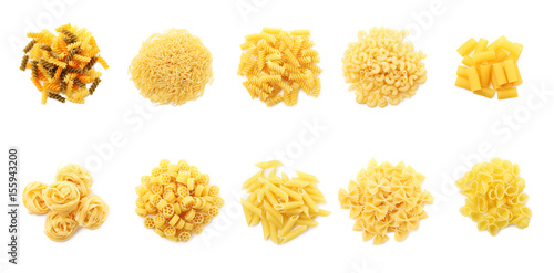 Collage of different dry pasta on white background photo