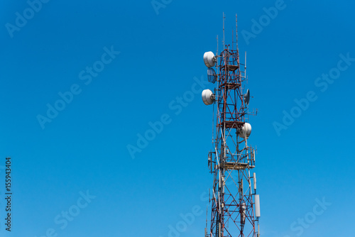 electronic signal pole with blue sky background