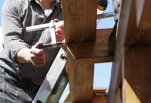 Schilderij op canvas Terrassenüberdachung - Pergola aus Holz montieren