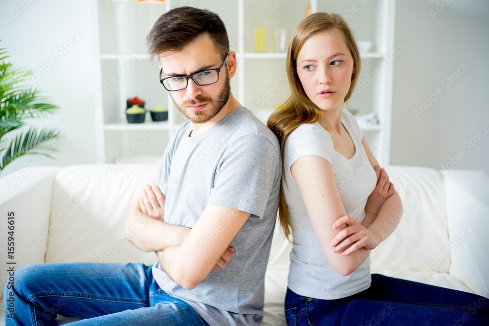 Loving couple swears on the sofa Loving couple swears on the sofa