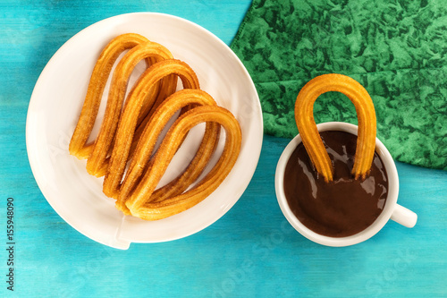 Churros with hot chocolate, traditional Spanish breakfast