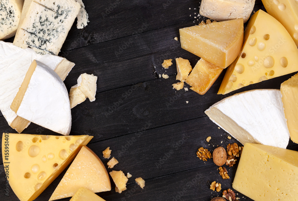 Fototapeta premium Various types of cheese. Top view. Copy space.