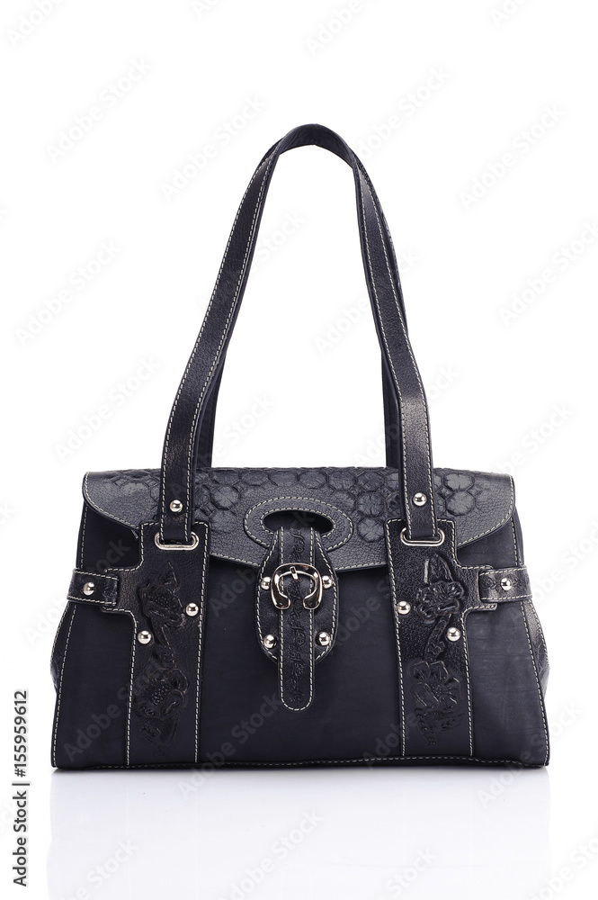 Leather ladies bag on a white background. Beautiful, fashionable, accessory, isolated. Interesting design, the texture of the skin. Comfortable handle. Leather ladies bag on a white background. Beautiful, fashionable, accessory, isolated. Interesting design, the texture of the skin. Comfortable handle.