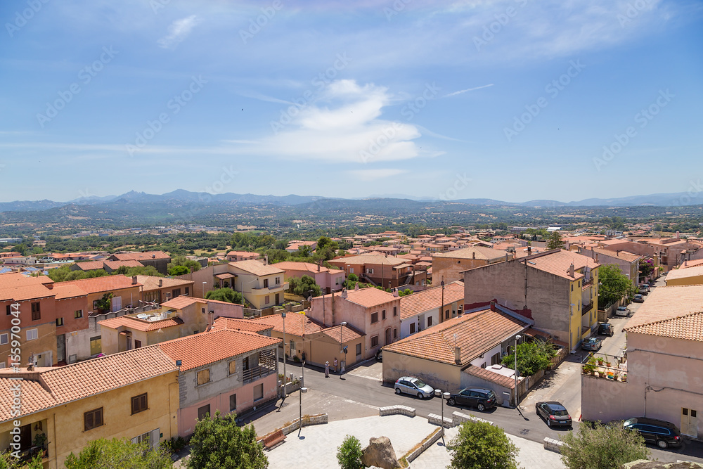 The island of Sardinia, Italy. Arzaken: a picturesque city landscape on the background of mountains