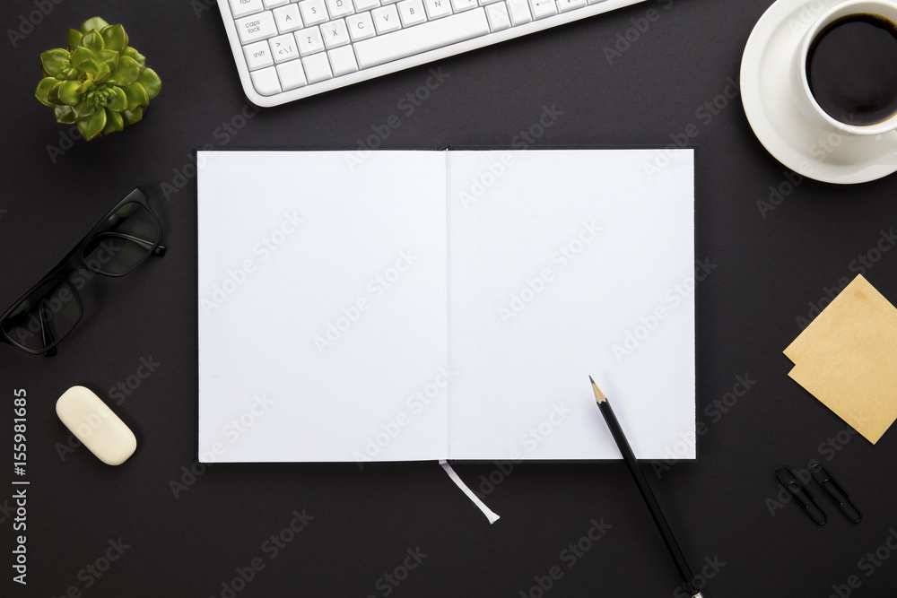Blank Paper Surrounded By Office Supplies On Gray Desk Blank Paper Surrounded By Office Supplies On Gray Desk