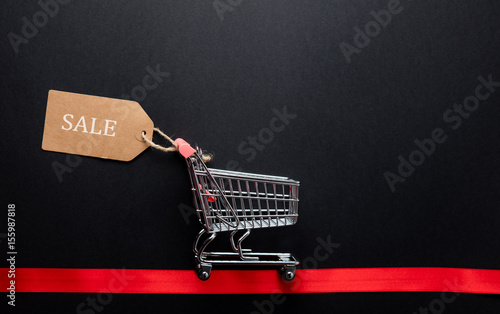 shopping cart with label and ribbon