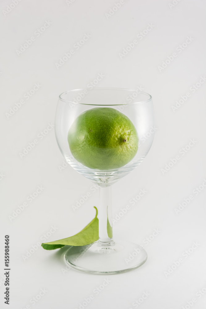 Fresh lemon in wine glass healthy living