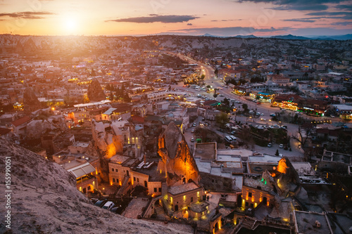 Turkish caves village Goreme at sunset © gilitukha