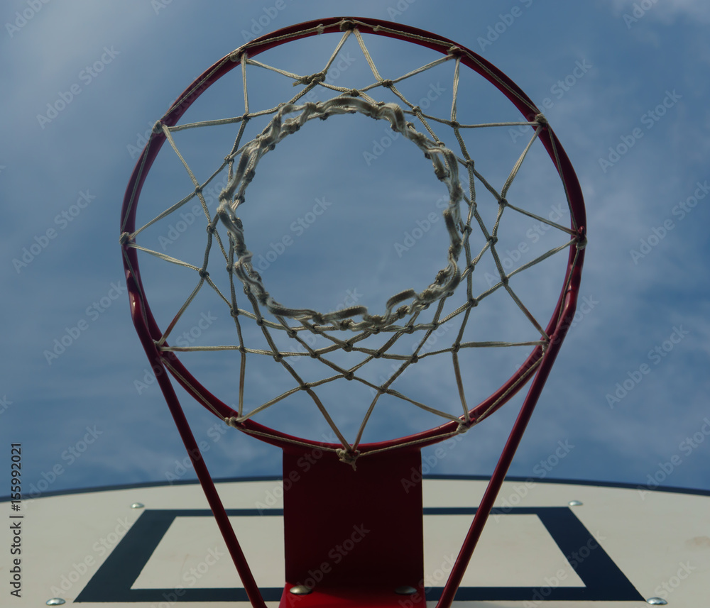 A look at the blue sky through the basketball ring A look at the blue sky through the basketball ring