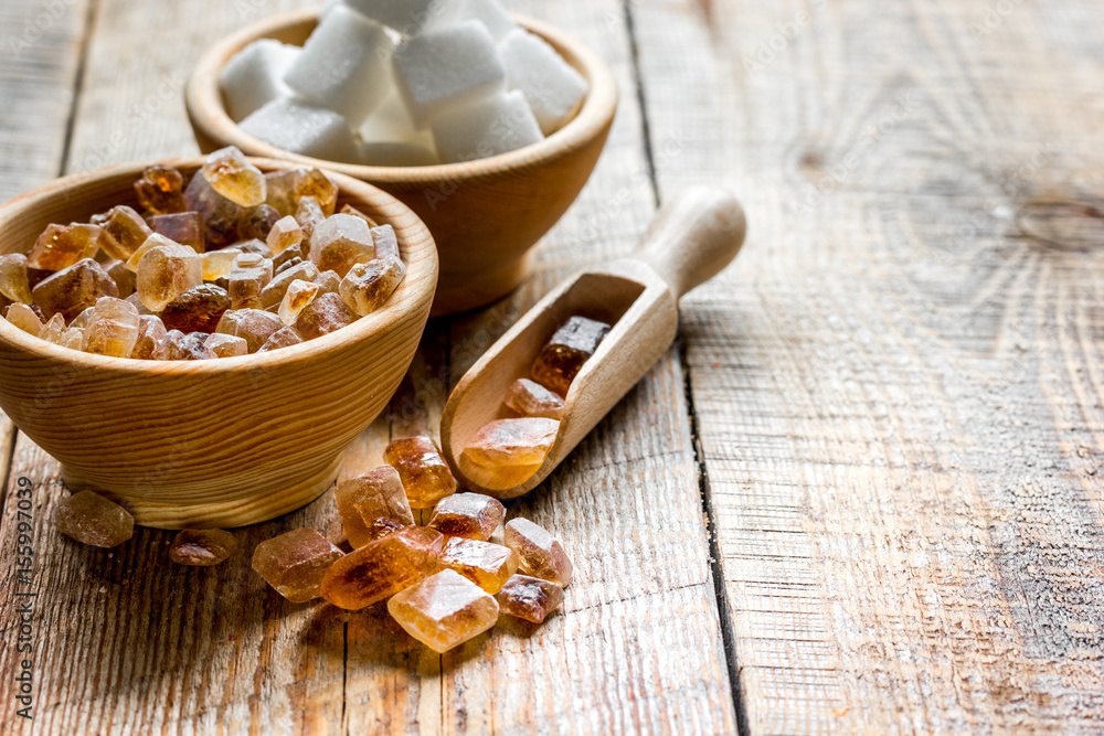 sugar cubes on wooden table background sugar cubes on wooden table background