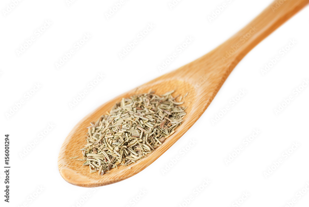 Rosemary in wooden spoon isolated on white Rosemary in wooden spoon isolated on white