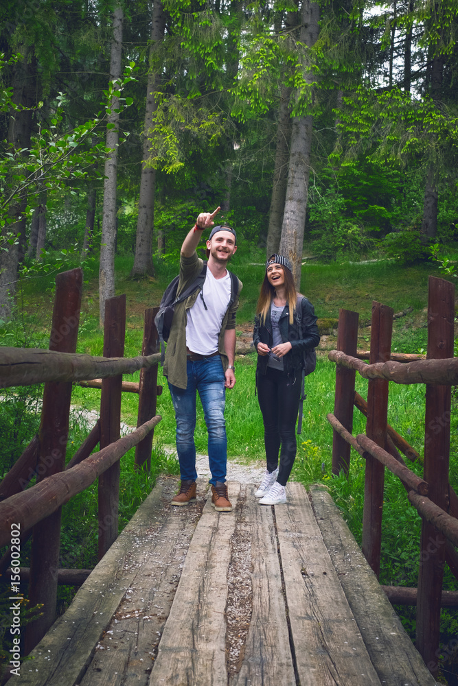 Young couple traveling in a nature. Happy people. Travel lifestyle 