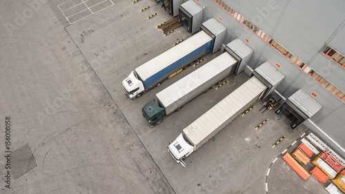 Trucks unloading in logostics center