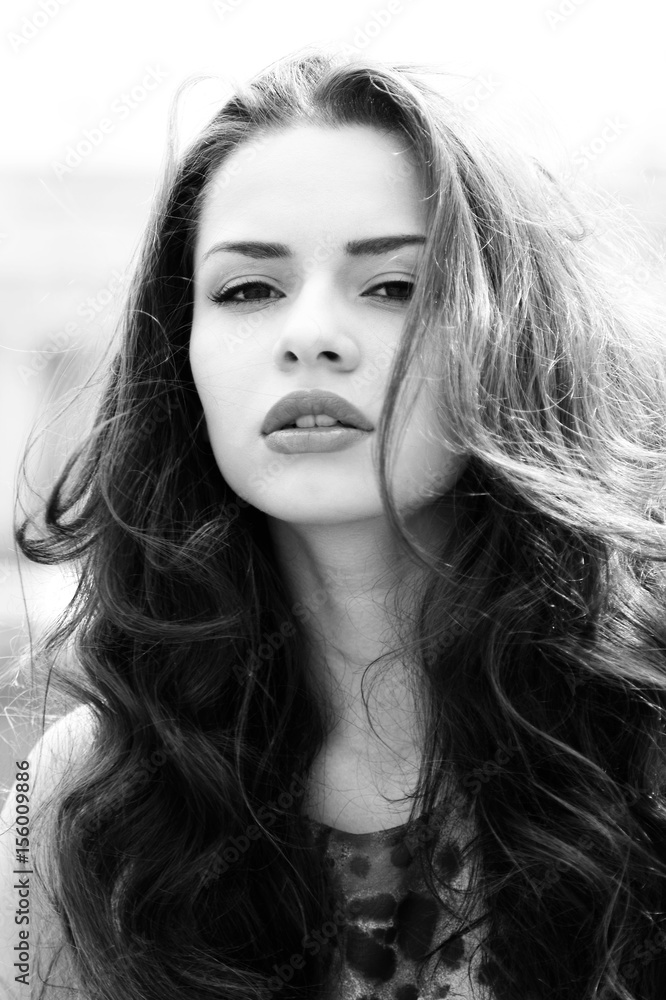 Naklejka premium outdoor fashion portrait of young beautiful woman with long dair hair 
