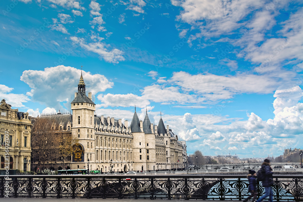 View of La Conciergerie, ex royal palace and prison, and Seine river in Paris, France in winter day.