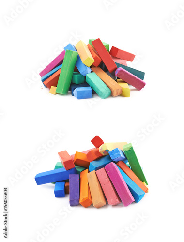 Pile of colorful pastel crayon chalks isolated