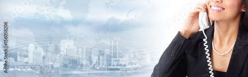 Business woman calling by phone