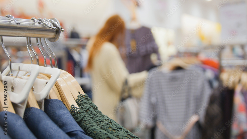 Shopping for women - hangers with clothes Shopping for women - hangers with clothes