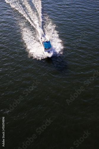 Motor boat with awning at high speed top view © vit