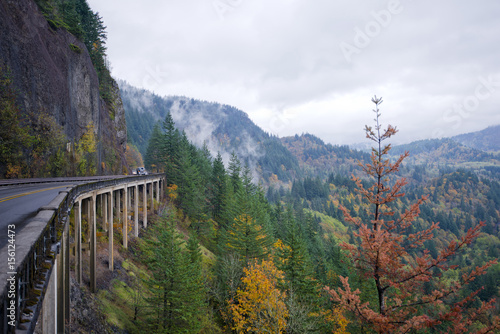 Panorama with autumn nature Columbia Gorge with truck overpass bridge