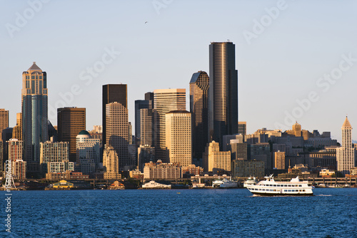 Passenger boat bay background skyscrapers downtown Seattle city