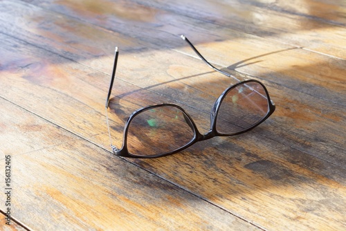 Fototapeta Naklejka Na Ścianę i Meble -  Glasses on a wooden table