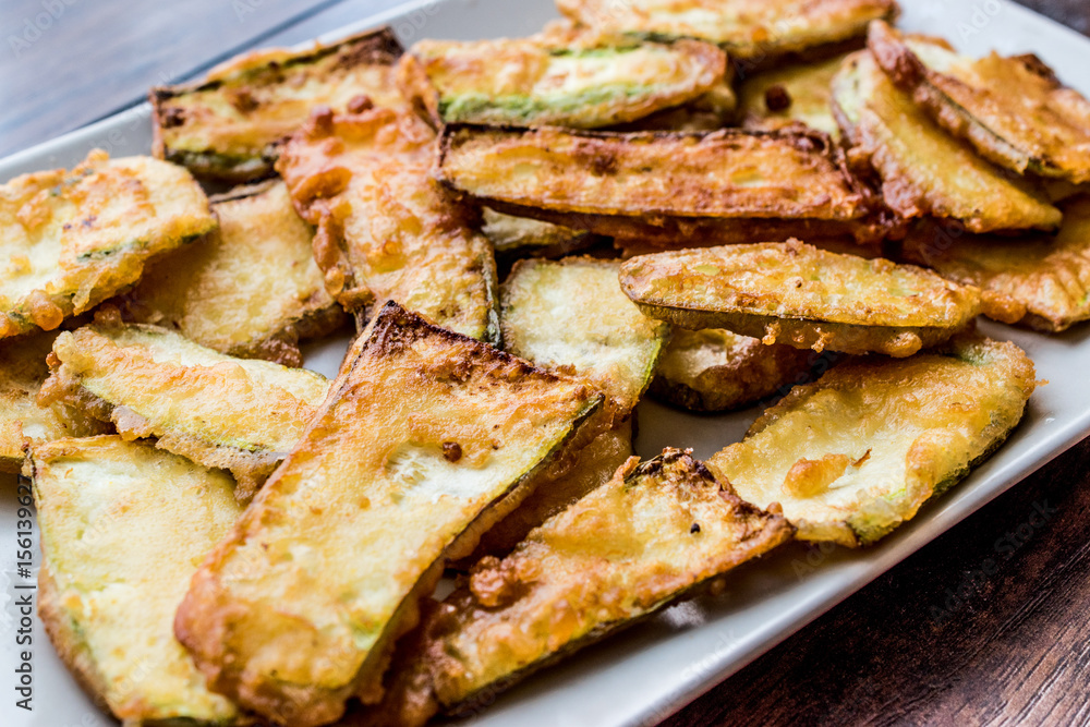 Homemade Fried Zucchini Fries on plate. Homemade Fried Zucchini Fries on plate.