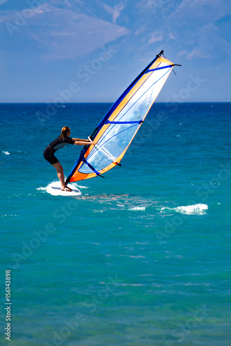 windsurfer at sea off the coast of Corfu, Greece, Europe