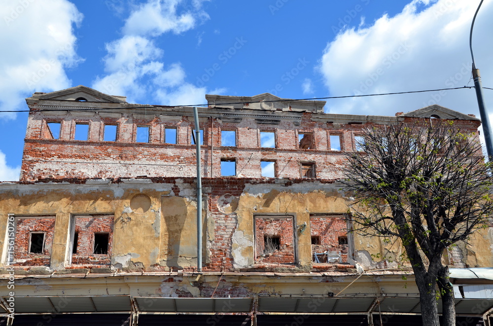 Facade of an old crumbling house in Kazan, Tatarstan Republic, Russia