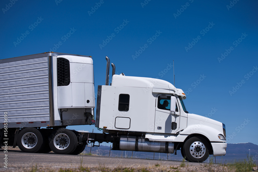 Power Semi truck rig and reefer trailer side view Stock Photo Adobe Stock