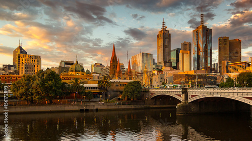 Melbourne City  Yarra River  Princes Bridge with Reflection Cityscape Skyline background under dramatic Golden Sky Sunset  Australia