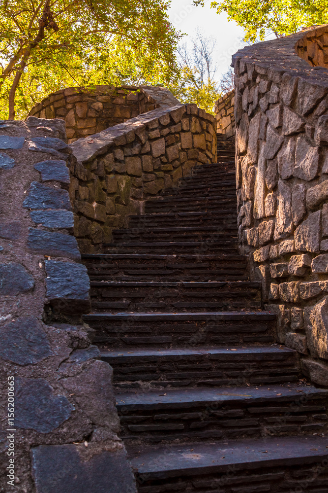 Stone stairs leading upward in the Stone Mountain Park in sunny autumn day, Georgia, USA