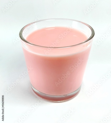 Strawberry milk in glass isolated on white
