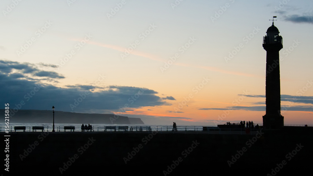 Whitby pier in silhouette