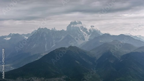 Cinematic fantasy-like awesome mountain beauty. Virgin nature. 2K Timelapse of the Ushba mountain. Caucasus. Svaneti. Georgia. Europe. UHD video (Ultra High Definition). photo