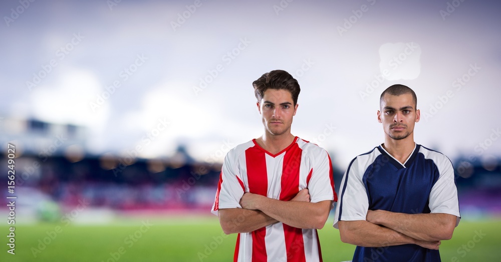 soccer players with his hands folded, blurred field background soccer players with his hands folded, blurred field background