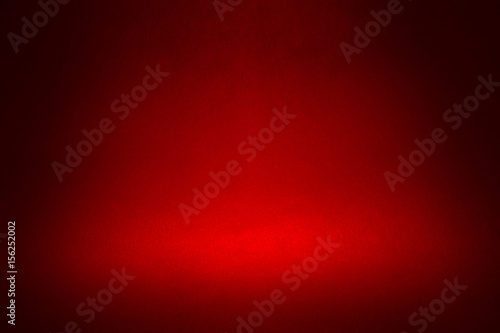 spotlight on a dark red material abstract background