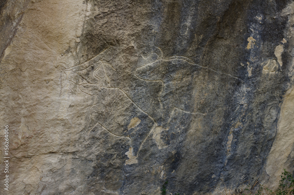 Petroglyphs made by primeval man. Gobustan national park. Azerbaijan